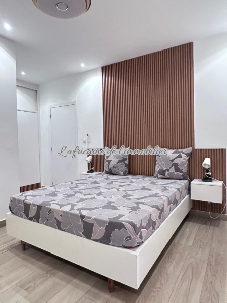 Chambre 1 - Appartement F3 Meublé Almadies :Terrasse, Piscine & Sécurité