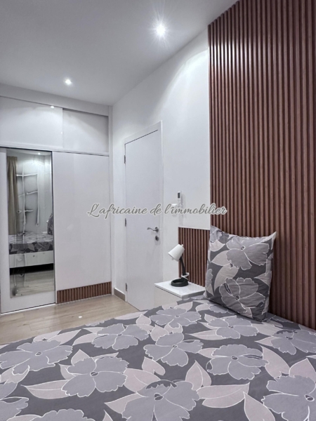 Chambre 1 - Appartement F3 Meublé Almadies :Terrasse, Piscine & Sécurité