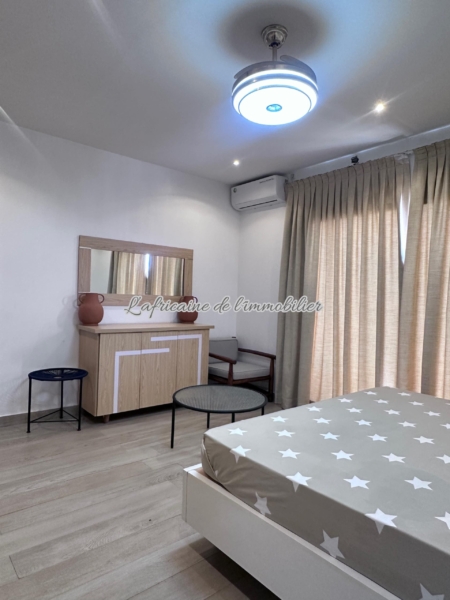 Chambre 2 - Appartement F3 Meublé Almadies :Terrasse, Piscine & Sécurité